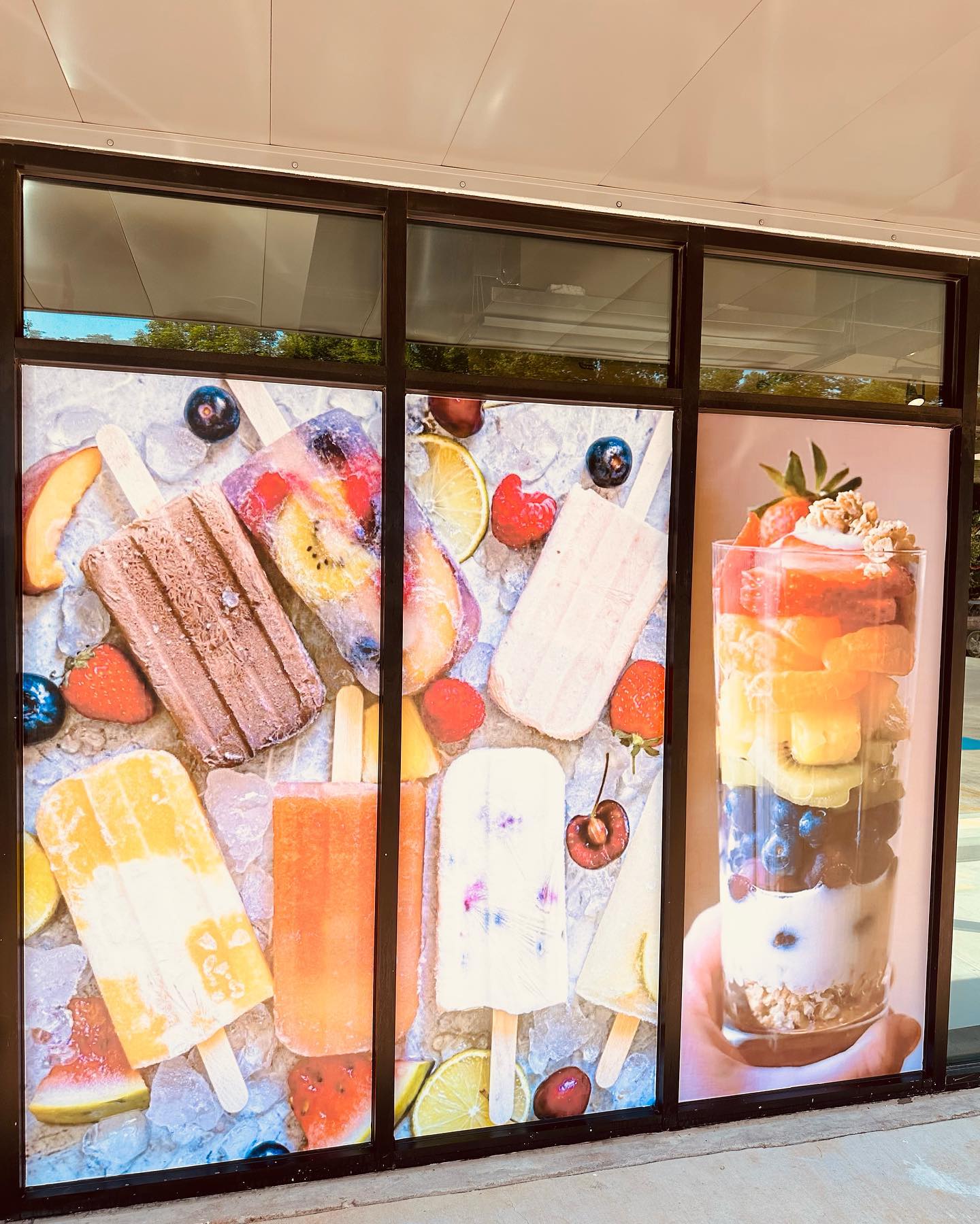 signage of ice cream and fruit cup